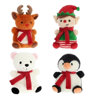 four stuffed animals including a reindeer an elf a bear and a penguin