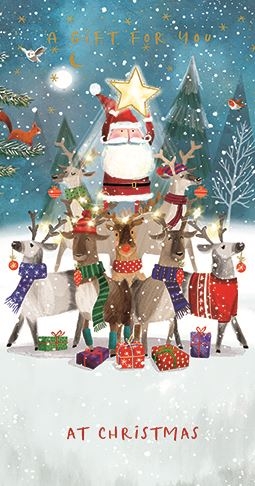 a christmas card with santa claus and reindeer standing next to each other in the snow .