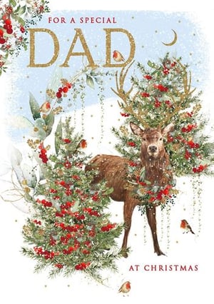 a christmas card for a special dad with a deer standing next to a christmas tree .