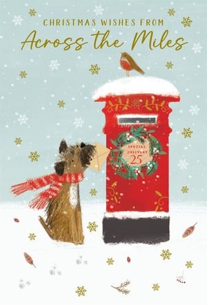 a dog is holding an envelope in front of a post box .