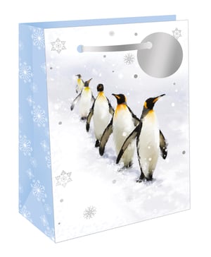 a gift bag with penguins and snowflakes on it