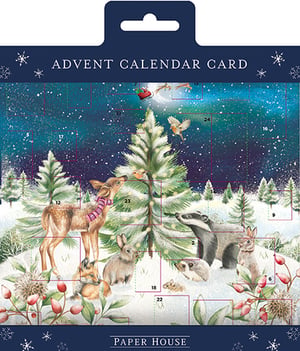 a paper house advent calendar card with animals in the snow