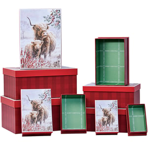 a stack of red boxes with merry christmas written on them