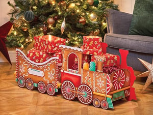 All aboard for festive fun! Introduce a touch of whimsical charm to your Christmas offerings with our Large Gingerbread Christmas Train Gift Boxes. This delightful, two-carriage train is beautifully designed to resemble a classic gingerbread creation, complete with intricate 'icing' details, snowflakes, and candy accents.

Perfect for displaying gifts under the tree or creating a magical focal point in any home, each train offers ample space for presents, making every delivery feel extra special. The 'Special Delivery For' label adds a personal touch that customers will adore.

Stock up on this enchanting seasonal item. Available in a convenient pack of 6, these trains are sure to be a popular choice for spreading Christmas cheer.