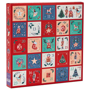 a red box with a nutcracker and a christmas tree on it