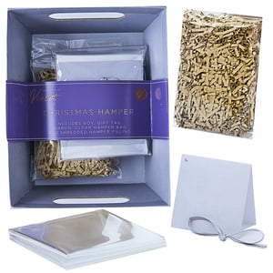 a christmas hamper includes box gift tags and shredded hamper filling