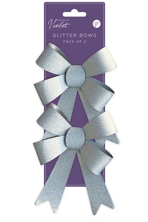 a package of silver glitter bows by violet