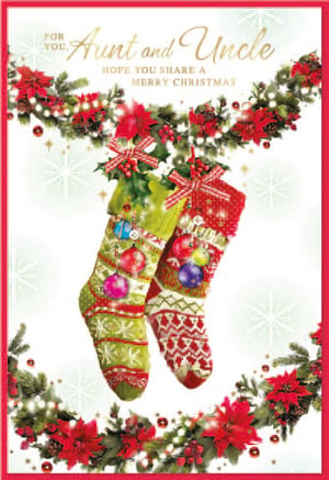 a christmas card for aunt and uncle with stockings hanging from a garland