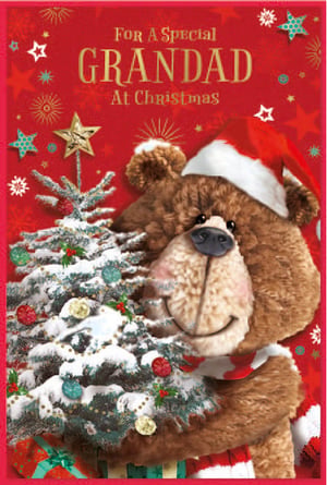 a teddy bear wearing a santa hat is holding a christmas tree