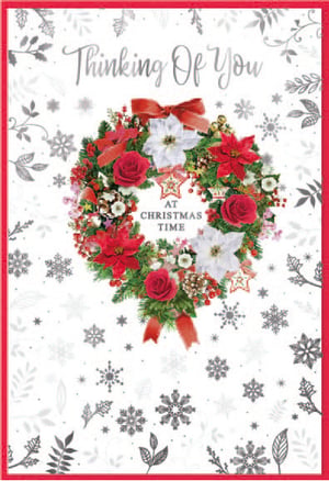 a christmas card that says thinking of you at christmas time