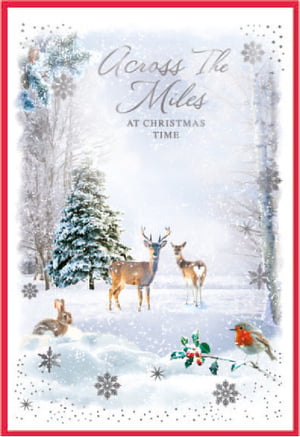 a christmas card that says across the miles at christmas time