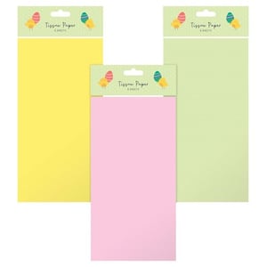 three packages of tissue paper with easter eggs on them .