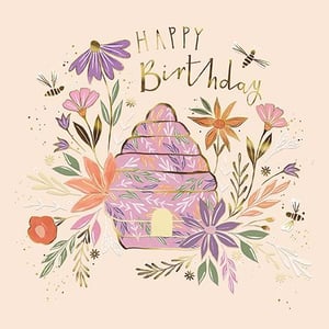a happy birthday card with a beehive surrounded by flowers and bees .