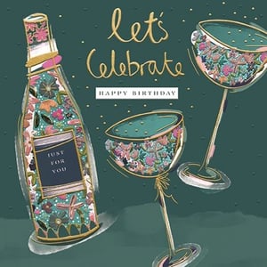 a birthday card with a bottle of champagne and two wine glasses filled with flowers .