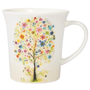 a white mug with a tree of flowers on it