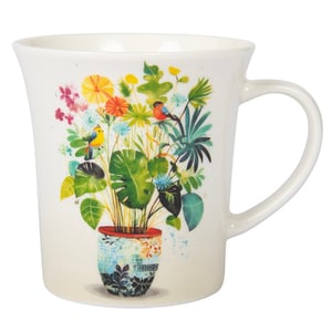 a mug with a plant and birds on it