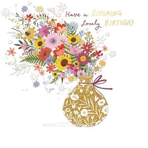 Brighten her birthday with this delightful 'Open Birthday Female' card from Ling. This charming design features a vibrant bouquet of mixed flowers, including cheerful sunflowers and delicate blooms, bursting from a beautifully patterned golden vase. A subtle burgundy ribbon adds an elegant touch. The card's playful message, "Have a BLOOMING lovely BIRTHDAY," is wonderfully scripted, making it a perfect choice for any special woman. Its artistic and whimsical style is sure to capture attention. Supplied in a convenient pack of 6, these cards are ideal for adding a touch of floral joy to your retail offering.