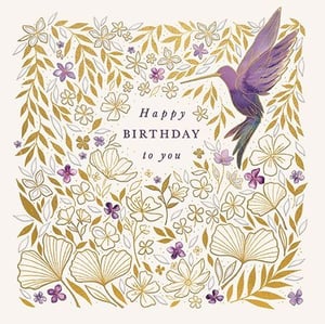 a birthday card with a hummingbird surrounded by flowers and leaves .