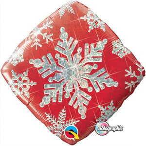 a red square shaped balloon with snowflakes on it