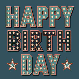 it looks like a light up sign that says `` happy birthday '' .