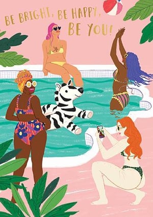 a group of women in bikinis are sitting in a swimming pool .