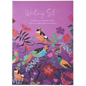 a writing set with birds and butterflies on a purple background