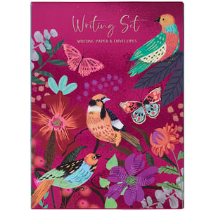 a writing set with birds and butterflies on a pink background