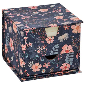 a small box with a floral design on it