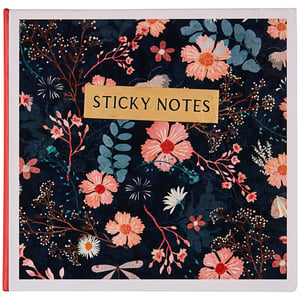 a sticky notes book with flowers on it
