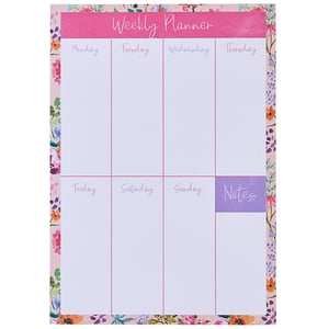 a pink and white weekly planner with flowers on it