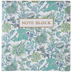 a note block with a floral pattern on it