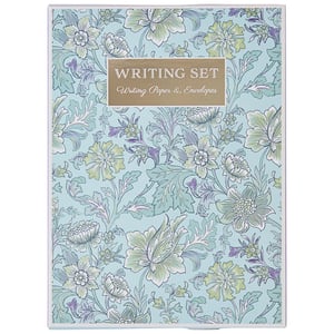 a writing set with a floral pattern on it