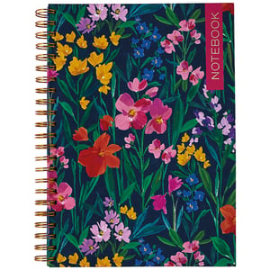 a notebook with colorful flowers on a dark blue background