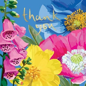 a thank you card with colorful flowers on a blue background