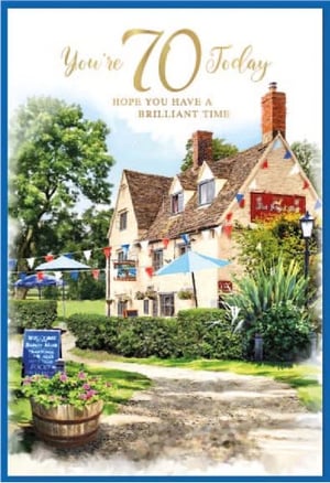 a 70th birthday card with a picture of a house .