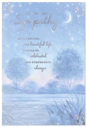 a sympathy card with a painting of a lake and trees on it .