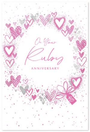 a ruby anniversary card with a wreath of pink and silver hearts