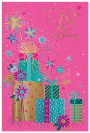 a pink birthday card with a stack of presents and flowers on it .