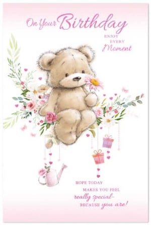 a teddy bear is holding a flower in its mouth on a birthday card .