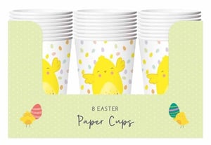 a box of paper cups with easter chicks and eggs on them .