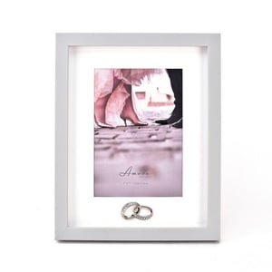 a picture frame with the word amore on it