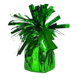 a green balloon weight wrapped in green foil on a white background .