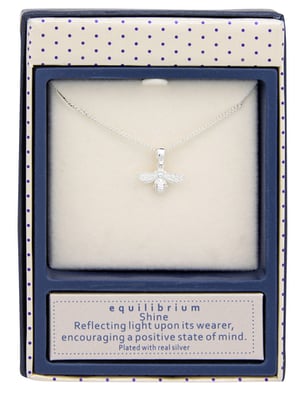 a silver necklace with a bee pendant on a chain .