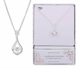 a necklace in a box that says equilibrium