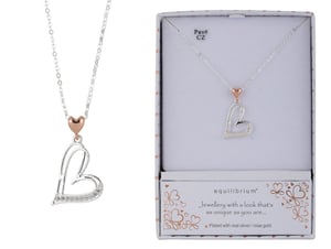 a necklace in a box that says equilibrium