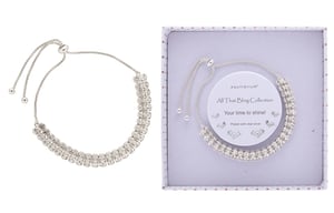a necklace in a box that says furry companions collection