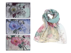 three different colored scarves with flowers on them