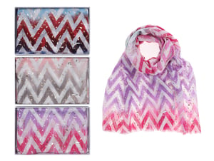 three different colored scarves with a chevron pattern