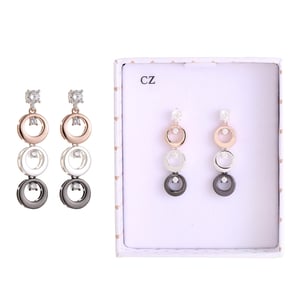 a pair of earrings in a box that says cz