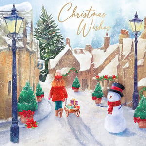 Bring the magic of Christmas to your customers with these delightful 'Girl In Village' cards from Second Nature. This charming watercolour design captures a heartwarming festive scene: a girl in a red coat pulls a sleigh laden with gifts through a snow-dusted village street. She passes a friendly snowman, twinkling Christmas trees, and traditional lampposts, all under a sky adorned with 'Christmas Wishes'.

Each pack contains 10 beautiful cards, perfect for spreading seasonal joy. Crucially, these cards also support EACH (East Anglia's Children's Hospices), offering your customers a meaningful way to give back this Christmas. Available in wholesale packs of 6.